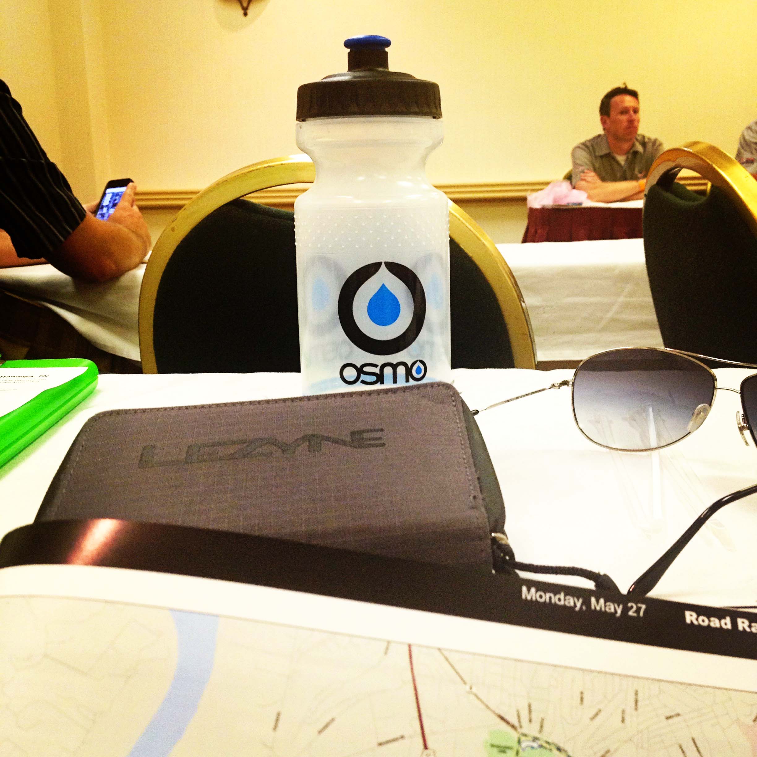 Multitasking: staying hydrated while attending the Manager's Meeting at US Pro Championships