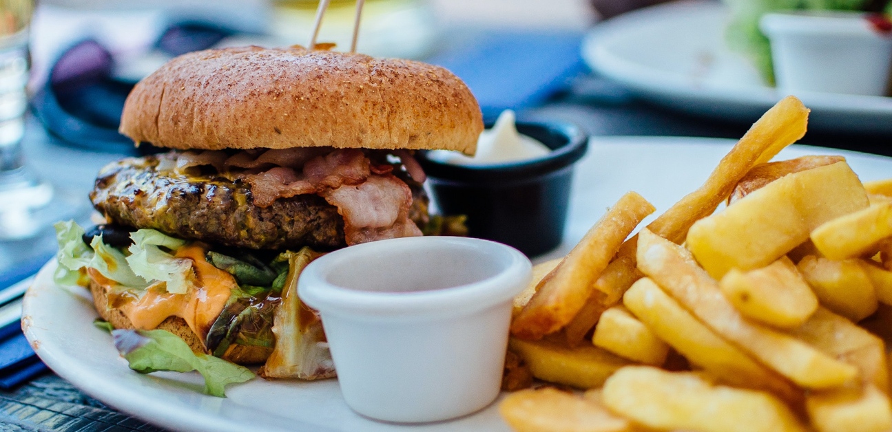 a delicious looking cheeseburger and fries