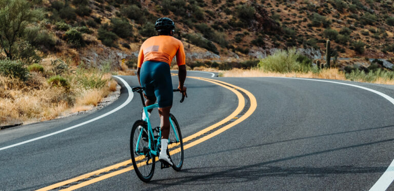 Cyclist Climbing out of Saddle