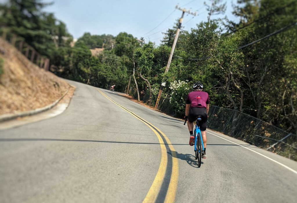 Jon Kaslow descends on his bike after a successful ride