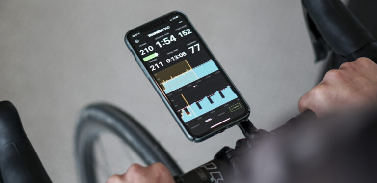 An athlete completes an interval workout included in a TrainerRoad training plan.