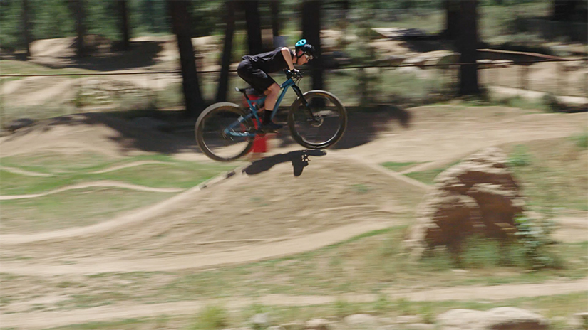 Jonathan is using the mountain biking technique of distributing his weight and keeping a hinged position.